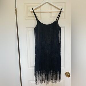 Black flapper style fringe dress. Perfect for roaring 20’s themed parties!